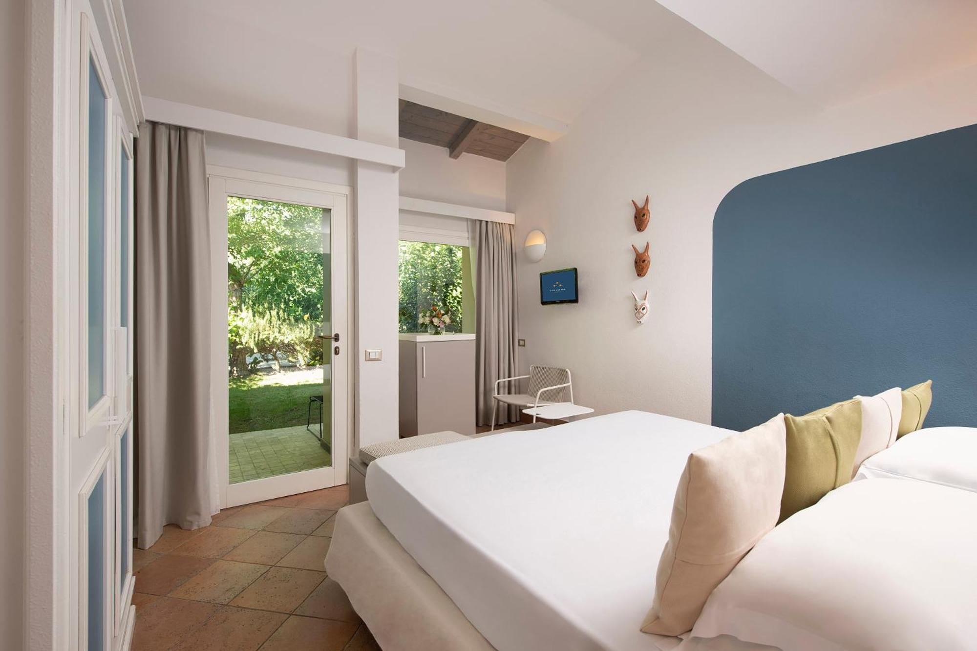 Chia Laguna - Hotel Village Rum bild